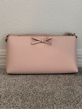 kate spade light pink bow wristlet crossbody
